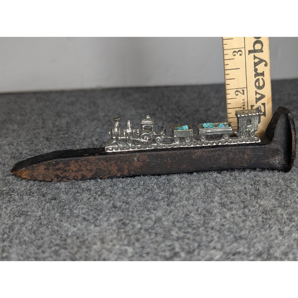 Railroad Spike With Silver Model Train On Top Hauling Topaz 7" Long - Picture 8 of 8